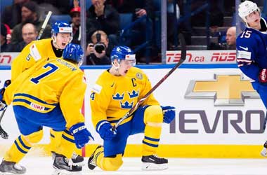 Sweden celebrate win vs USA in Semi-Final at World Junior Championship 2018
