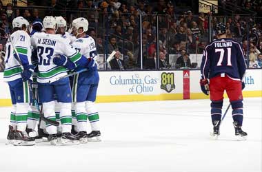 Vancouver Canucks celebrate scoring fourth goal vs Columbus Bluejackets: January 12th 2018