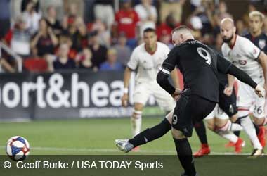 Late Rooney penalty denies Toronto