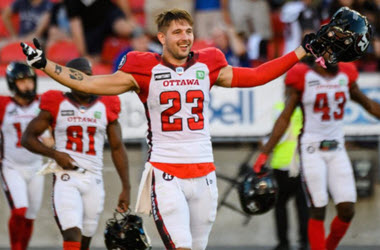 ottawa-redblacks-Jjelon-acklin-celebrates-the-teams-first-win-of-the-season-as-he-leaves-bmo-field-in-toronto-on-sunday.