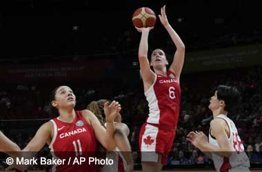 Canadas Bridget Carleton scoring against Japan at Women's Basketball World Cup 2022
