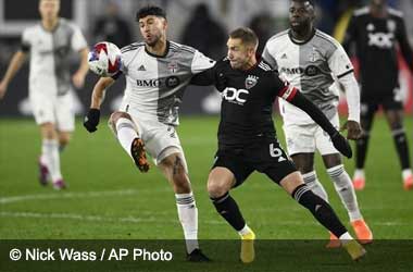 Jonathan Osorio and Russell Canouse  battle for the ball in DC United vs Toronto FC MLS Match 2023