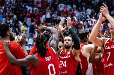 Canada's Men Basketball team celebrate qualifying for the 2024 Olympics