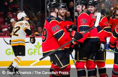 Drake Batherson celebrates goal with teammate in win against the Boston Bruins during 2025 NHL Season