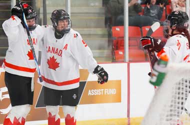 Canada celebrate beating Hungary at the 2026 IIHF World Women's U18 Championship Group Stage