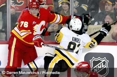 Calgary Flames Lose 4-1 Against the Pittsburgh Penguins Martin Pospisil hits Ben Kindel in loss to the Pittsburgh Penguins during 2025 NHL season