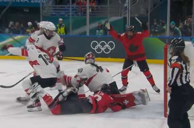 Marie-Philip Poulin Leads Canada Back to a Gold Medal Game at the 2026 Winter Olympics Marie-Philip Poulin dives in to score second goal against Switzerland at the 2026 Winter Olympics