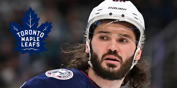 Kirill Marchenko signs for the Toronto Maple Leafs